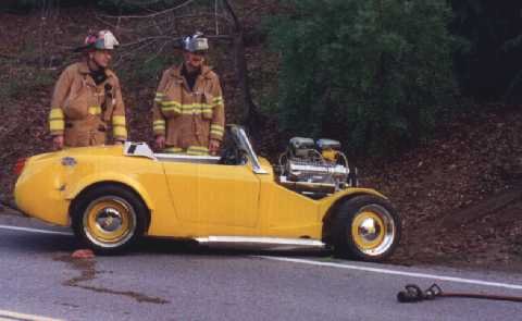 car in the redwood trees (after the boys crashed it)